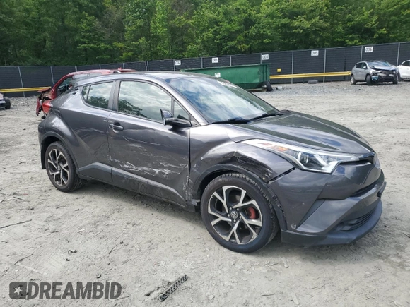 2018 Toyota C-HR XLE z VIN JTNKHMBX2J1003394, wystawiony jako Copart lot #58234865 z przebiegiem 132 574 mil mil oraz Szkoda całkowita • Salvage title. Historia ofert i sprzedaży dostępna na DreamBid. Obrazek 4.