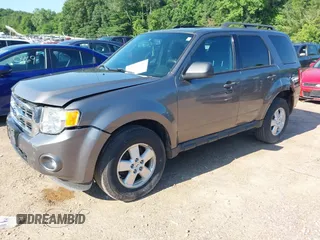 2012 Ford Escape XLT z VIN 1FMCU9DG7CKB28270, wystawiony jako IAAI lot #42607520 z przebiegiem 129 758 mil mil oraz . Historia ofert i sprzedaży dostępna na DreamBid. Obrazek 17.