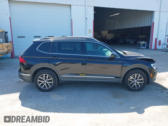 2020 Volkswagen Tiguan SE z VIN 3VV3B7AX7LM035567, wystawiony jako IAAI lot #42316223 z przebiegiem 64 730 mil mil oraz . Historia ofert i sprzedaży dostępna na DreamBid. Obrazek 13.