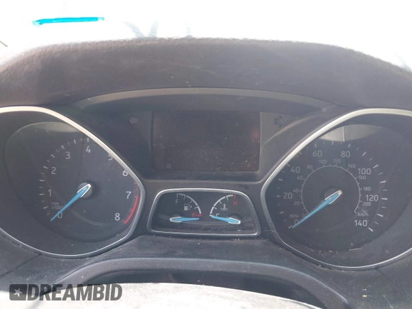 2016 Ford Focus SE z VIN 1FADP3F28GL237888, wystawiony jako IAAI lot #42564140 z przebiegiem 143 210 mil mil oraz . Historia ofert i sprzedaży dostępna na DreamBid. Obrazek 7.