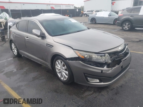 2014 Kia Optima EX z VIN 5XXGN4A75EG290132, wystawiony jako IAAI lot #41292706 z przebiegiem 155 793 mil mil oraz . Historia ofert i sprzedaży dostępna na DreamBid. Obrazek 1.