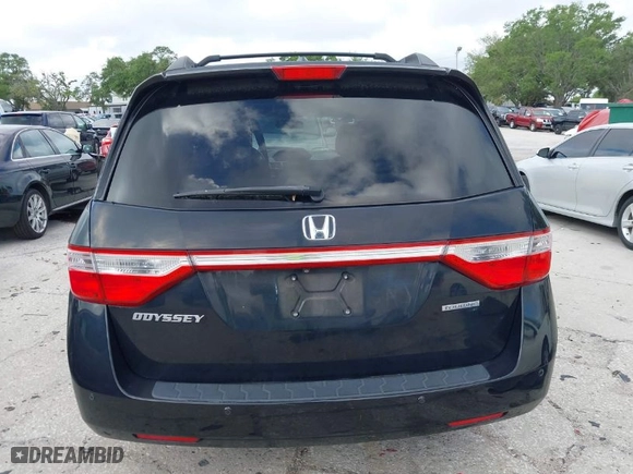 2013 Honda Odyssey Touring with VIN 5FNRL5H92DB003200, listed as a IAAI auction lot 41920237 with 167,483 mi miles. Bid and sale history available at carsss.com. Image 16.