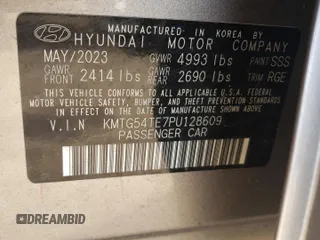 2023 Genesis G70 3.3T with VIN KMTG54TE7PU128609, listed as a Copart auction lot 53644364 with 5,843 mi miles and Salvage title. Bid and sale history available at DreamBid. Image 13.