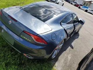 2012 Fisker Karma EcoSport z VIN YH4K14AA3CA001524, wystawiony jako Copart lot #74501534 z przebiegiem 15 969 mil mil oraz Nie do naprawy. Historia ofert i sprzedaży dostępna na DreamBid. Obrazek 3.