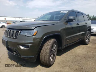2017 Jeep Grand Cherokee Limited 75th Anniversary with VIN 1C4RJFBT2HC675308, listed as a Copart auction lot 58049585 with 136,330 mi miles and Salvage title. Bid and sale history available at DreamBid. Image 1.