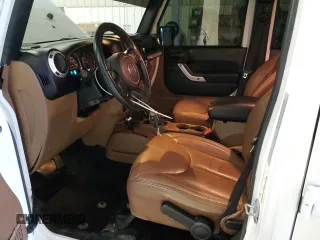 2017 Jeep Wrangler Unlimited Sahara with VIN 1C4HJWEG6HL622282, listed as a Copart auction lot 47382505 with 146,351 mi miles and Salvage Title. Bid and sale history available at carsss.com. Image 7.