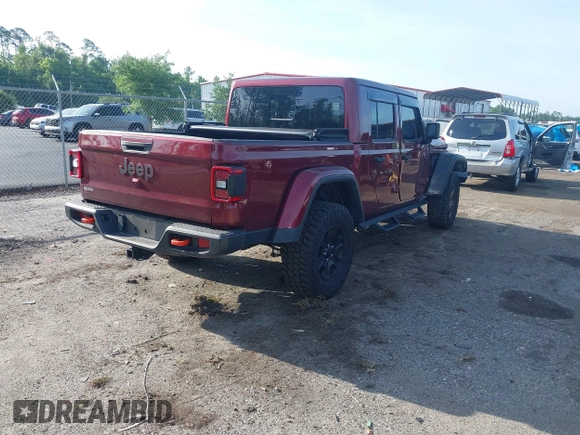 2021 Jeep Gladiator Mojave with VIN 1C6JJTEG8ML592381, listed as a IAAI auction lot 42369581 with 75,295 mi miles and . Bid and sale history available at DreamBid. Image 4.