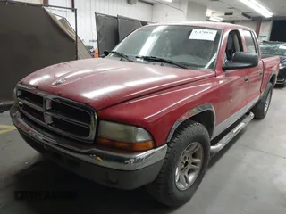 2001 Dodge Dakota Sport with VIN 1B7HL2AN81S296293, listed as a IAAI auction lot 41470036 with 203,323 mi miles. Bid and sale history available at carsss.com. Image 18.