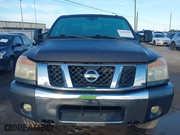 2010 Nissan Titan with VIN 1N6BA0FC1AN320629, listed as a IAAI auction lot 42491569 with 169,819 mi miles and . Bid and sale history available at DreamBid. Image 12.