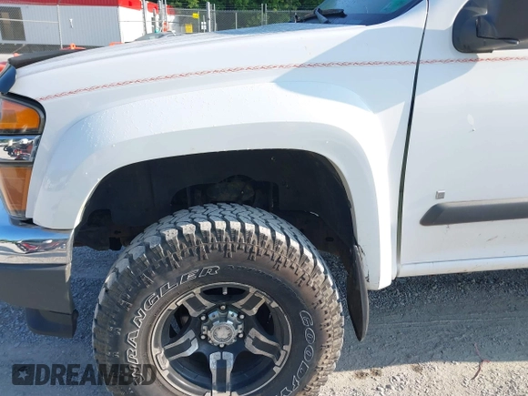 2007 Chevrolet Colorado 1LT z VIN 1GCDT13E978249656, wystawiony jako IAAI lot #42445862 z przebiegiem 115 298 mil mil oraz . Historia ofert i sprzedaży dostępna na DreamBid. Obrazek 6.