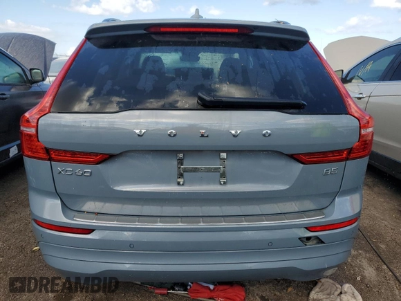 2022 Volvo XC60 Momentum z VIN YV4L12DK8N1909801, wystawiony jako Copart lot #77384044 z przebiegiem Nie podano mil oraz Nie do naprawy • Non repairable. Historia ofert i sprzedaży dostępna na DreamBid. Obrazek 6.