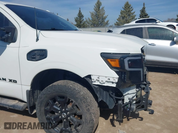 2018 Nissan Titan XD SV with VIN 1N6BA1F40JN523851, listed as a IAAI auction lot 41800730 with 104,527 mi miles. Bid and sale history available at carsss.com. Image 17.