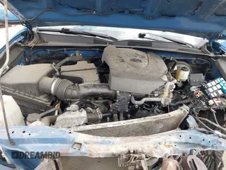 2019 Toyota Tacoma SR z VIN 3TMCZ5AN7KM280607, wystawiony jako IAAI lot #41692718 z przebiegiem 46 084 mil mil oraz . Historia ofert i sprzedaży dostępna na DreamBid. Obrazek 10.