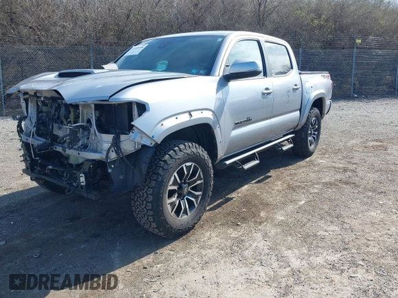 2020 Toyota Tacoma SR5 with VIN 3TMCZ5AN3LM320411, listed as a IAAI auction lot 41838498 with 50,252 mi miles and . Bid and sale history available at DreamBid. Image 19.