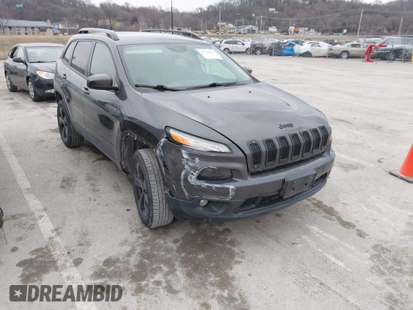 2016 Jeep Cherokee Latitude z VIN 1C4PJMCB9GW152673, wystawiony jako IAAI lot #41704412 z przebiegiem 140 559 mil mil oraz . Historia ofert i sprzedaży dostępna na DreamBid. Obrazek 1.