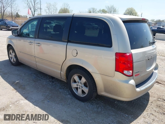 2013 Dodge Grand Caravan SE with VIN 2C4RDGBG9DR642162, listed as a IAAI auction lot 42113378 with 182,370 mi miles and . Bid and sale history available at DreamBid. Image 3.