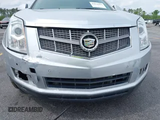 2011 Cadillac SRX Luxury Collection with VIN 3GYFNAEY5BS563048, listed as a IAAI auction lot 42031973 with 182,047 mi miles and . Bid and sale history available at DreamBid. Image 6.