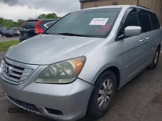 2010 Honda Odyssey EX with VIN 5FNRL3H48AB017784, listed as a IAAI auction lot 42096852 with 126,138 mi miles. Bid and sale history available at carsss.com. Image 6.