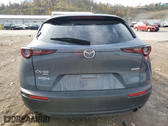 2022 Mazda CX-30 S Preferred with VIN 3MVDMBCL7NM400941, listed as a Copart auction lot 77876364 with 66,031 mi miles and Salvage Title. Bid and sale history available at carsss.com. Image 6.