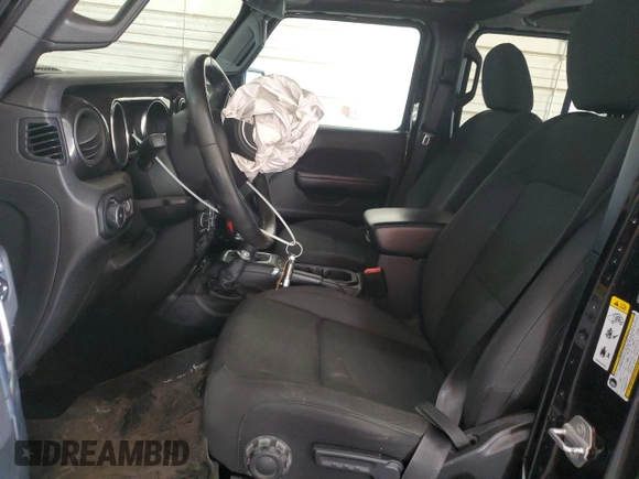 2020 Jeep Wrangler Unlimited Sport Altitude with VIN 1C4HJXDN9LW154318, listed as a Copart auction lot 56473335 with 99,482 mi miles and Salvage title. Bid and sale history available at DreamBid. Image 7.