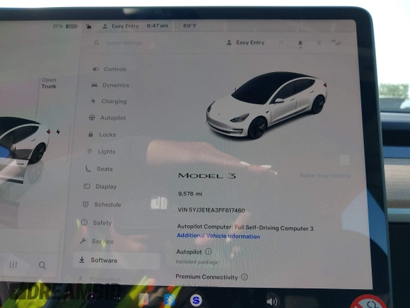 2023 Tesla Model 3 with VIN 5YJ3E1EA3PF617460, listed as a IAAI auction lot 42154401 with 9,578 mi miles and . Bid and sale history available at DreamBid. Image 7.