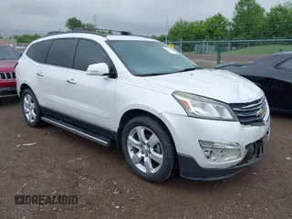 2016 Chevrolet Traverse LT z VIN 1GNKVGKD8GJ206522, wystawiony jako IAAI lot #42313619 z przebiegiem 180 466 mil mil oraz . Historia ofert i sprzedaży dostępna na DreamBid. Obrazek 1.