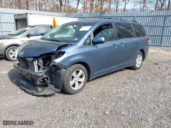 2014 Toyota Sienna LE AAS with VIN 5TDKK3DC9ES510487, listed as a IAAI auction lot 41781743 with 152,917 mi miles. Bid and sale history available at carsss.com. Image 2.