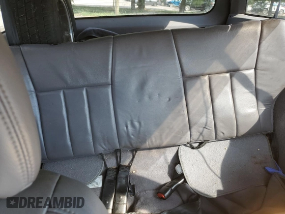 1997 Jeep Cherokee with VIN 1J4FN78S6VL604971, listed as a Copart auction lot 70690304 with 226,913 mi miles and Salvage title. Bid and sale history available at DreamBid. Image 11.
