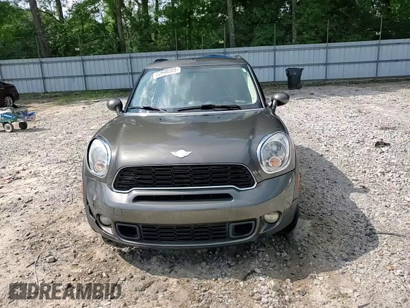 2014 MINI Countryman S with VIN WMWZC3C57EWP25099, listed as a Copart auction lot 62646555 with 153,059 mi miles and Salvage title. Bid and sale history available at DreamBid. Image 13.