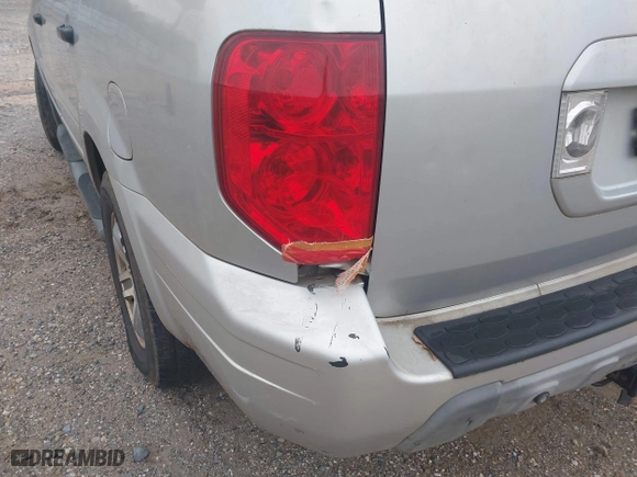 2003 Honda Pilot EX with VIN 2HKYF18523H543302, listed as a IAAI auction lot 42052364 with 331,473 mi miles. Bid and sale history available at carsss.com. Image 6.