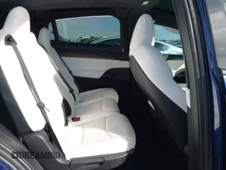 2022 Tesla Model X with VIN 7SAXCDE58NF341112, listed as a IAAI auction lot 41632491 with Not Provided miles and . Bid and sale history available at DreamBid. Image 8.