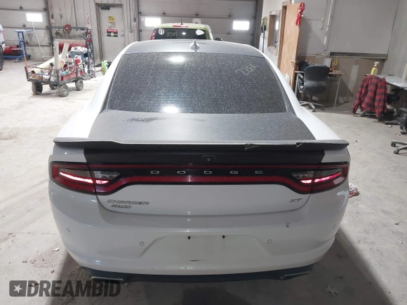 2015 Dodge Charger SXT with VIN 2C3CDXJG9FH785729, listed as a IAAI auction lot 41802261 with 145,974 mi miles. Bid and sale history available at carsss.com. Image 16.