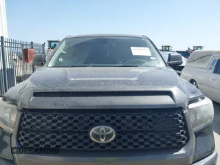 2019 Toyota Tundra SR with VIN 5TFRM5F16KX140346, listed as a IAAI auction lot 41830638 with 86,824 mi miles and . Bid and sale history available at DreamBid. Image 12.