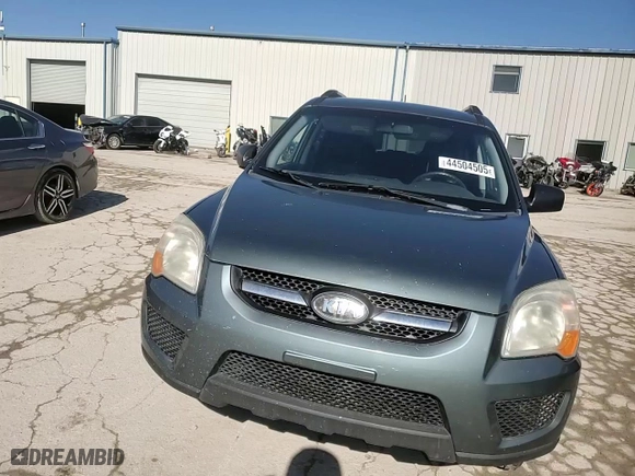 2009 Kia Sportage LX with VIN KNDJF724497573841, listed as a Copart auction lot 44504505 with 162,800 mi miles and Salvage Title. Bid and sale history available at carsss.com. Image 12.