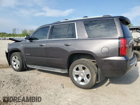 2015 Chevrolet Tahoe LTZ z VIN 1GNSKCKC4FR626030, wystawiony jako Copart lot #56280805 z przebiegiem Nie podano mil oraz Szkoda całkowita • Salvage title. Historia ofert i sprzedaży dostępna na DreamBid. Obrazek 2.