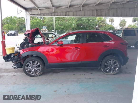 2023 Mazda CX-30 S Carbon Edition with VIN 3MVDMBCM3PM537841, listed as a IAAI auction lot 42080487 with 22,718 mi miles and . Bid and sale history available at DreamBid. Image 15.
