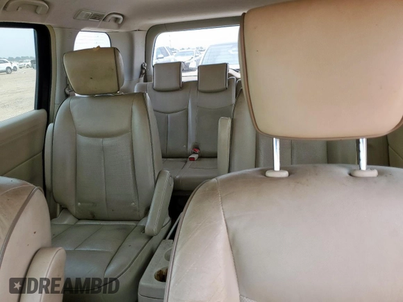 2014 Nissan Quest SV z VIN JN8AE2KP0E9101509, wystawiony jako Copart lot #58003325 z przebiegiem 198 287 mil mil oraz Czysty tytuł • Clean title. Historia ofert i sprzedaży dostępna na DreamBid. Obrazek 10.