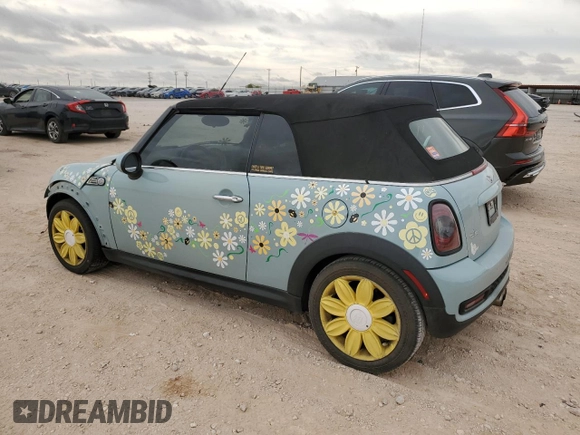 2014 MINI Convertible S with VIN WMWZP3C56ET707425, listed as a Copart auction lot 50894965 with 100,116 mi miles and Salvage Title. Bid and sale history available at DreamBid. Image 2.