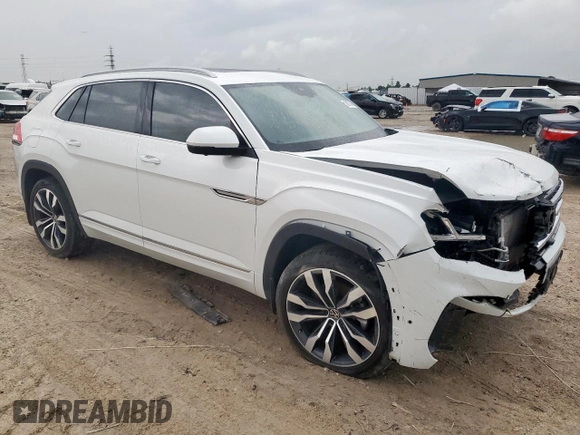 2022 Volkswagen Atlas SEL Premium R-Line with VIN 1V2FE2CA6NC220596, listed as a Copart auction lot 58773465 with 13,119 mi miles and Salvage title. Bid and sale history available at DreamBid. Image 4.