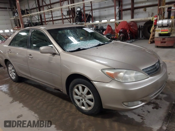 2003 Toyota Camry LE with VIN 4T1BE32K73U136399, listed as a IAAI auction lot 41877554 with 235,078 mi miles and . Bid and sale history available at DreamBid. Image 1.