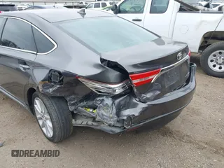 2015 Toyota Avalon Limited with VIN 4T1BK1EB4FU167011, listed as a IAAI auction lot 41582722 with 77,314 mi miles and . Bid and sale history available at DreamBid. Image 6.