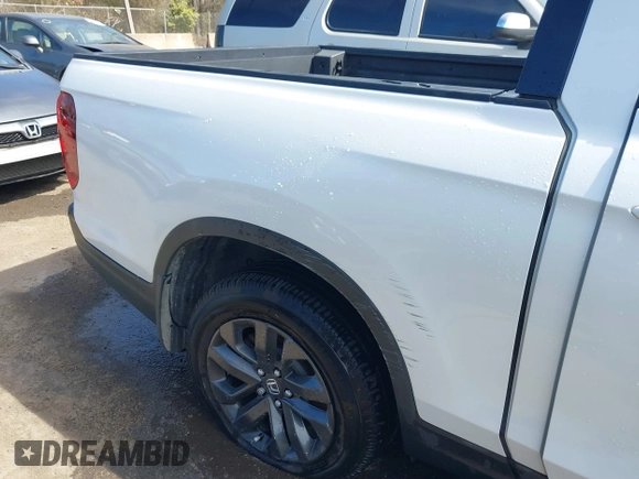 2022 Honda Ridgeline Sport z VIN 5FPYK3F12NB009135, wystawiony jako IAAI lot #41705000 z przebiegiem 50 551 mil mil oraz . Historia ofert i sprzedaży dostępna na DreamBid. Obrazek 6.