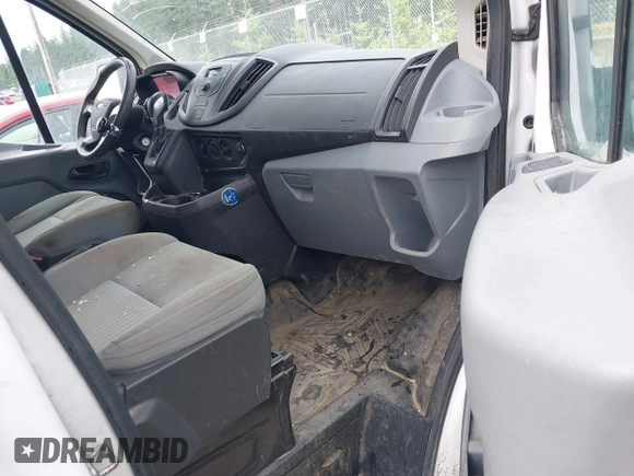 2015 Ford Transit Cargo with VIN 1FTNR1ZM6FKA34609, listed as a IAAI auction lot 42635875 with 214,750 mi miles and . Bid and sale history available at DreamBid. Image 5.