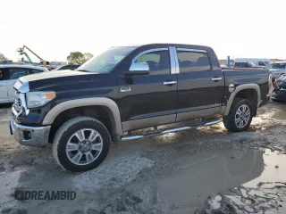 2015 Toyota Tundra 4WD Truck Platinum with VIN 5TFAW5F17FX472339, listed as a Copart auction lot 68848543 with 105,149 mi miles. Bid and sale history available at carsss.com. Image 1.