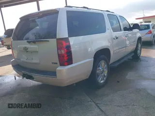 2010 Chevrolet Suburban LTZ with VIN 1GNUKKE38AR251895, listed as a IAAI auction lot 42020123 with 166,130 mi miles. Bid and sale history available at carsss.com. Image 4.