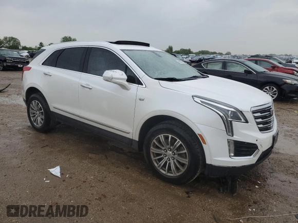 2017 Cadillac XT5 Luxury FWD with VIN 1GYKNBRS3HZ323826, listed as a Copart auction lot 58239735 with 67,416 mi miles and Salvage title. Bid and sale history available at DreamBid. Image 4.