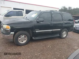 2003 GMC Yukon SLT with VIN 1GKEC13Z43J327937, listed as a IAAI auction lot 41543517 with 277,485 mi miles. Bid and sale history available at carsss.com. Image 6.