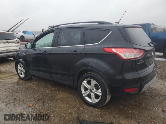2015 Ford Escape SE with VIN 1FMCU9GX7FUC44640, listed as a Copart auction lot 77141033 with 148,967 mi miles and Salvage Title. Bid and sale history available at DreamBid. Image 2.