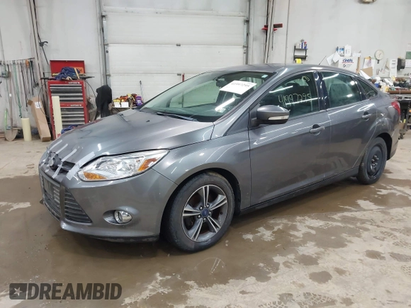 2014 Ford Focus SE with VIN 1FADP3F24EL310431, listed as a IAAI auction lot 41997295 with 108,718 mi miles. Bid and sale history available at carsss.com. Image 2.