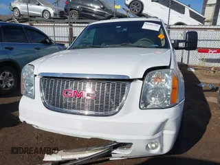 2014 GMC Yukon XL SLT with VIN 1GKS1KE00ER125405, listed as a IAAI auction lot 41609280 with 221,690 mi miles. Bid and sale history available at carsss.com. Image 12.